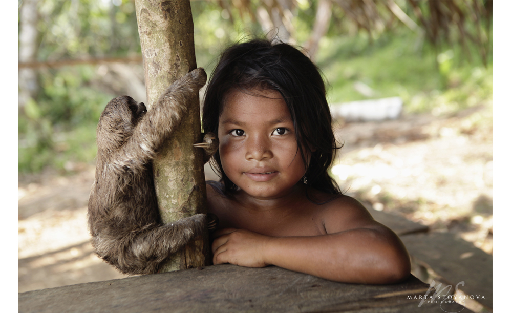 Amazon Yagua girl with sloth